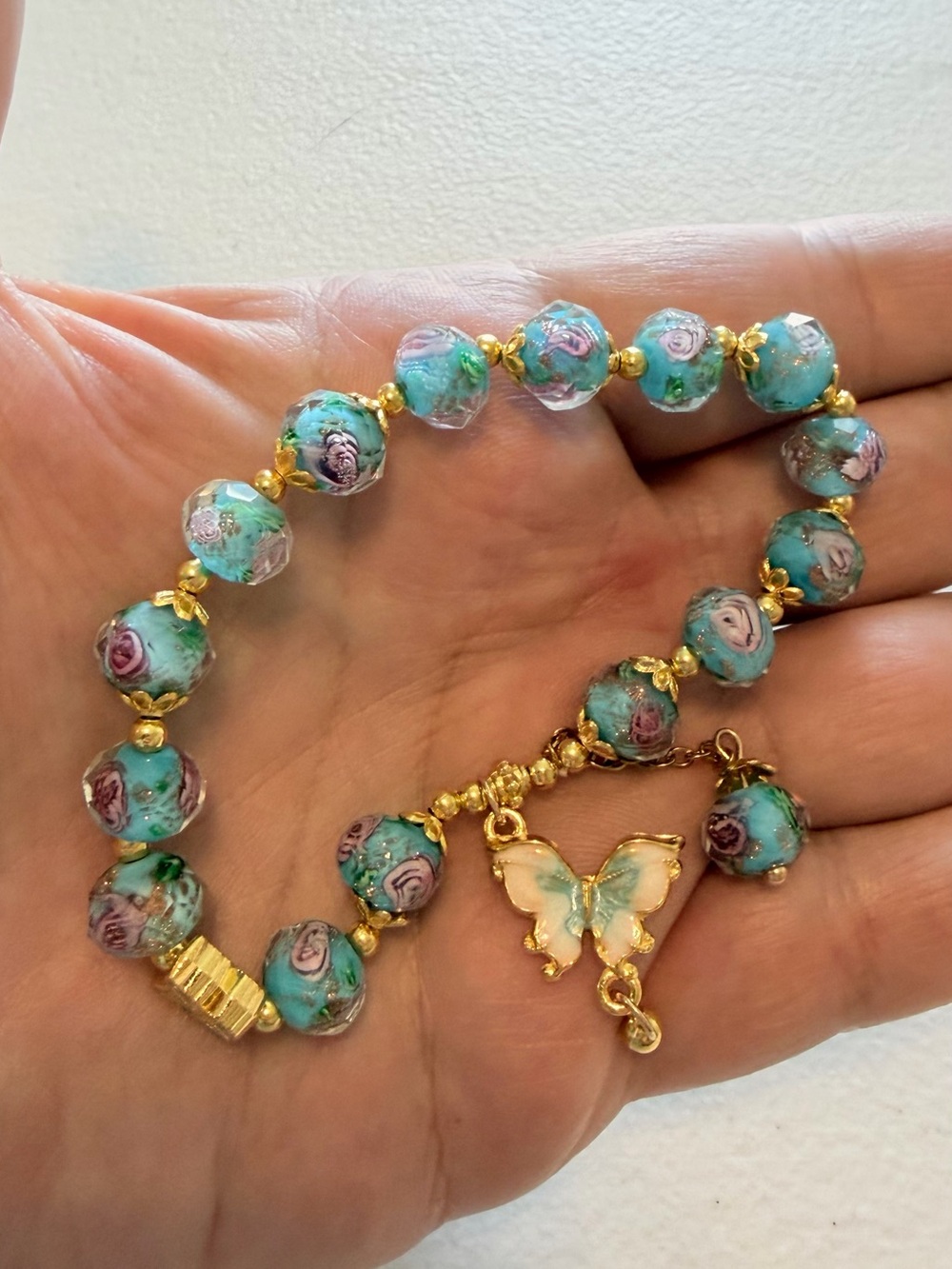 Gold Butterfly Charm Blue Floral Bracelet. - Picture 7 of 8